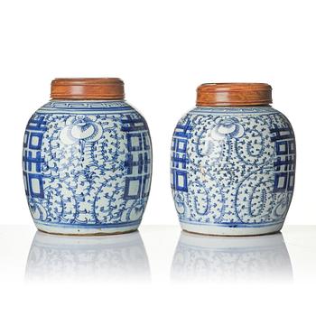 A pair of blue and white porcelain pots with covers, China, 19th century.
