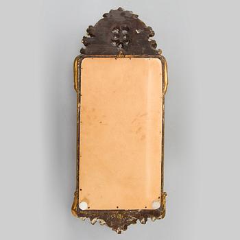 A Rococo mirror sconce, 18th Century.