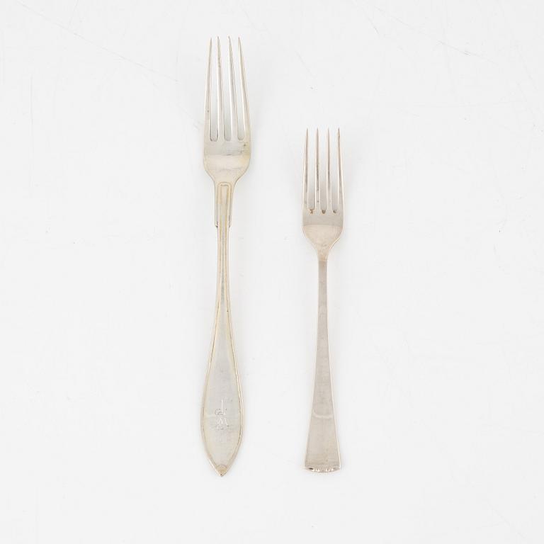 Eleven silver place forks and twelve silver sandwish forks, Sweden, 1917-1961.