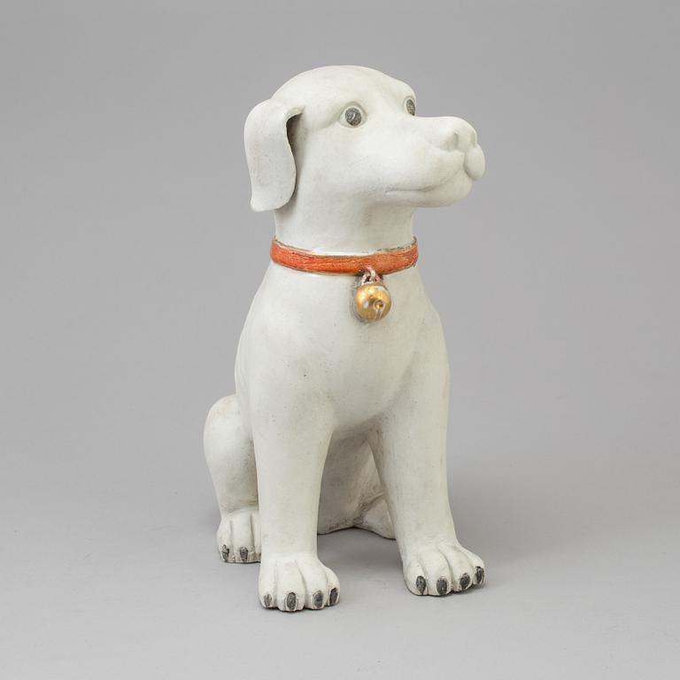 A chinese porcelain figure of a dog, after a 18th century model. China, 20th Century.