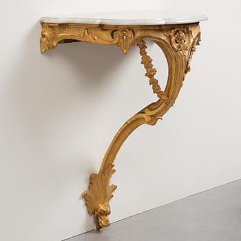A rococo giltwood and marble console table, Stockholm, later part 18th century.