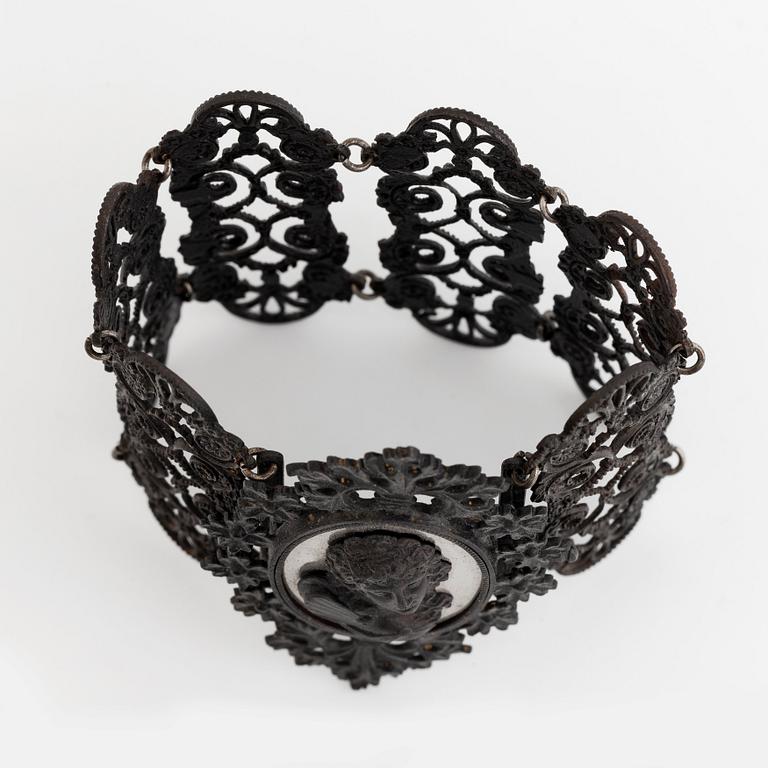 A Berlin iron and steel bracelet with a cameo.