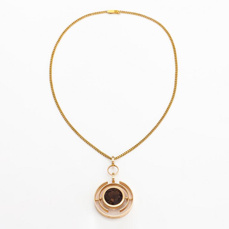 Elis Kauppi, A 14K gold and smoky quartz necklace. Kupittaan kulta, Turku 1965.