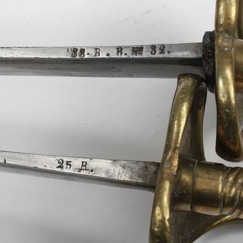 Two Swedish cutlasses 1748-1856 pattern with scabbards.