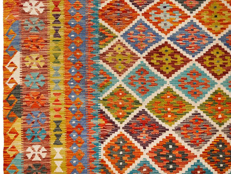 A kilim carpet, approximately 353 x 246 cm.