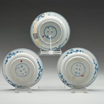 Three blue and white dishes, Ming dynasty, 17th Century with Jiajing six character mark.