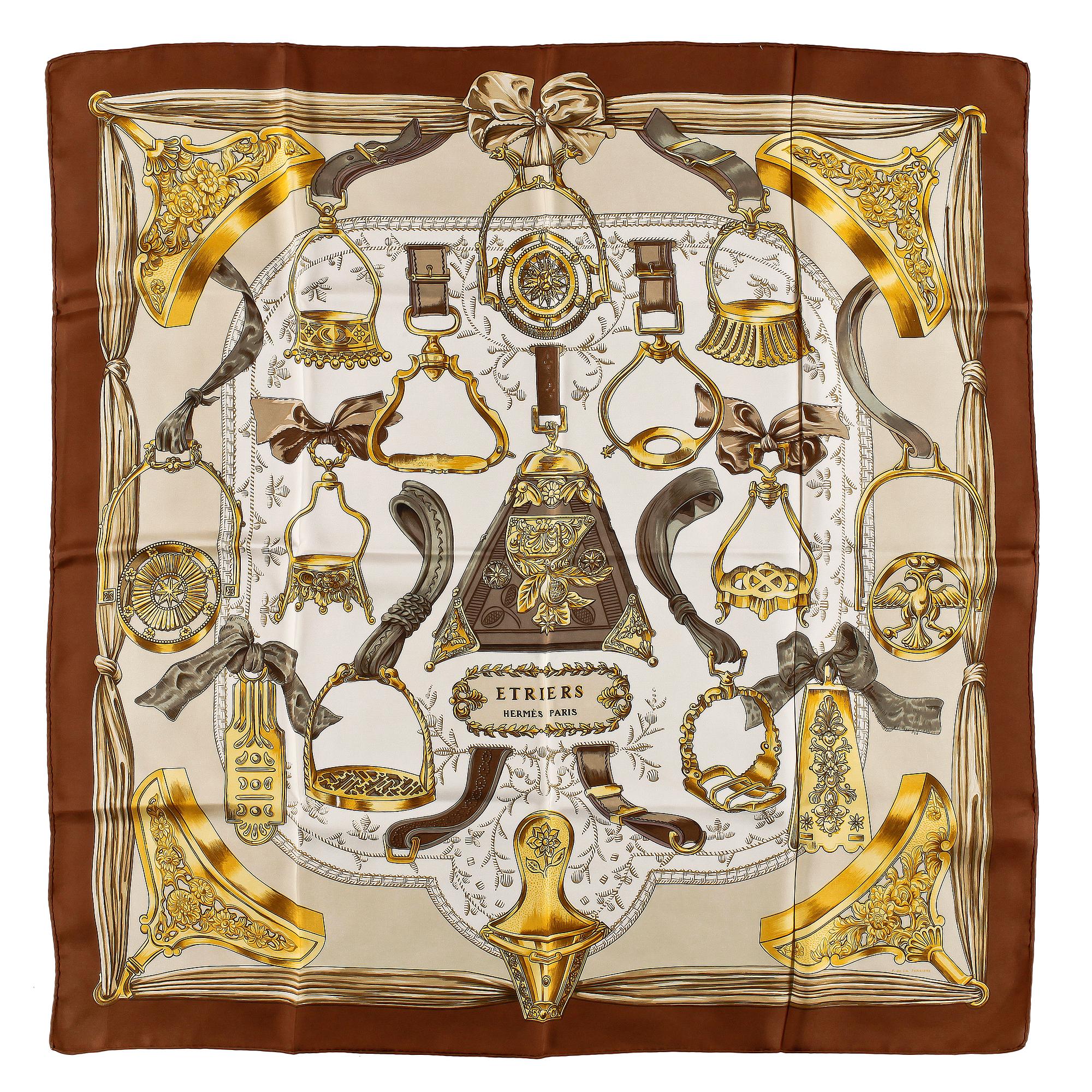 A set of three silk scarves by Hermès, "Etriers" and "Thalassa".