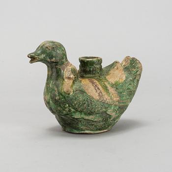 A green and yellow glazed bisquit duckshaped ewer, Ming dynasty (1368-1644).