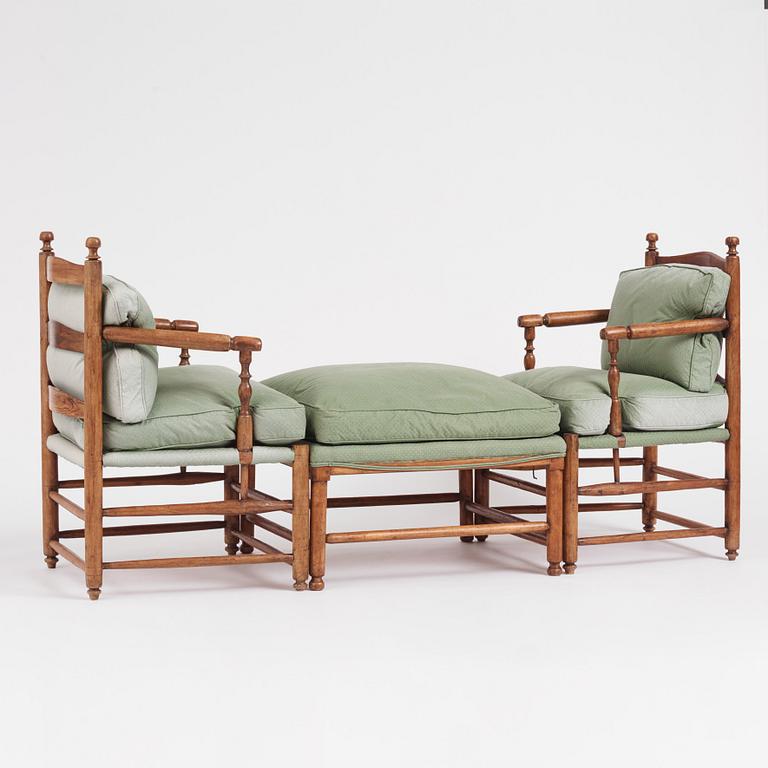 A pair of Gustavian 'Gripsholm' armchairs and an ottoman by J. Hammarström (master 1794-1812).