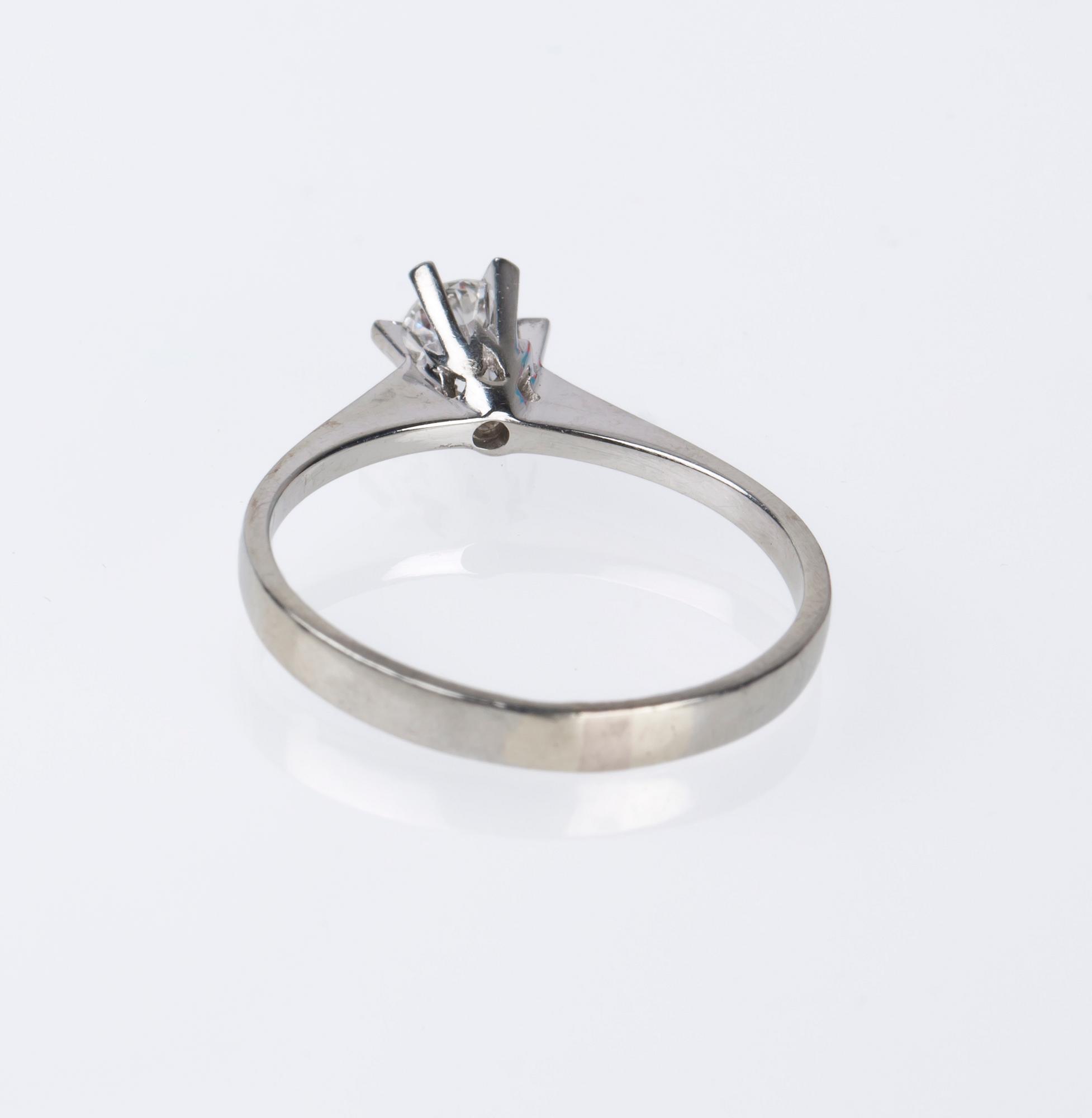 RING, 18K vitguld med briljatslipad diamant, ca 0.20 ct.