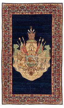 420. A semi-antique pictoral 'Lion and Sun' Kerman rug, c. 243 x 144 cm.