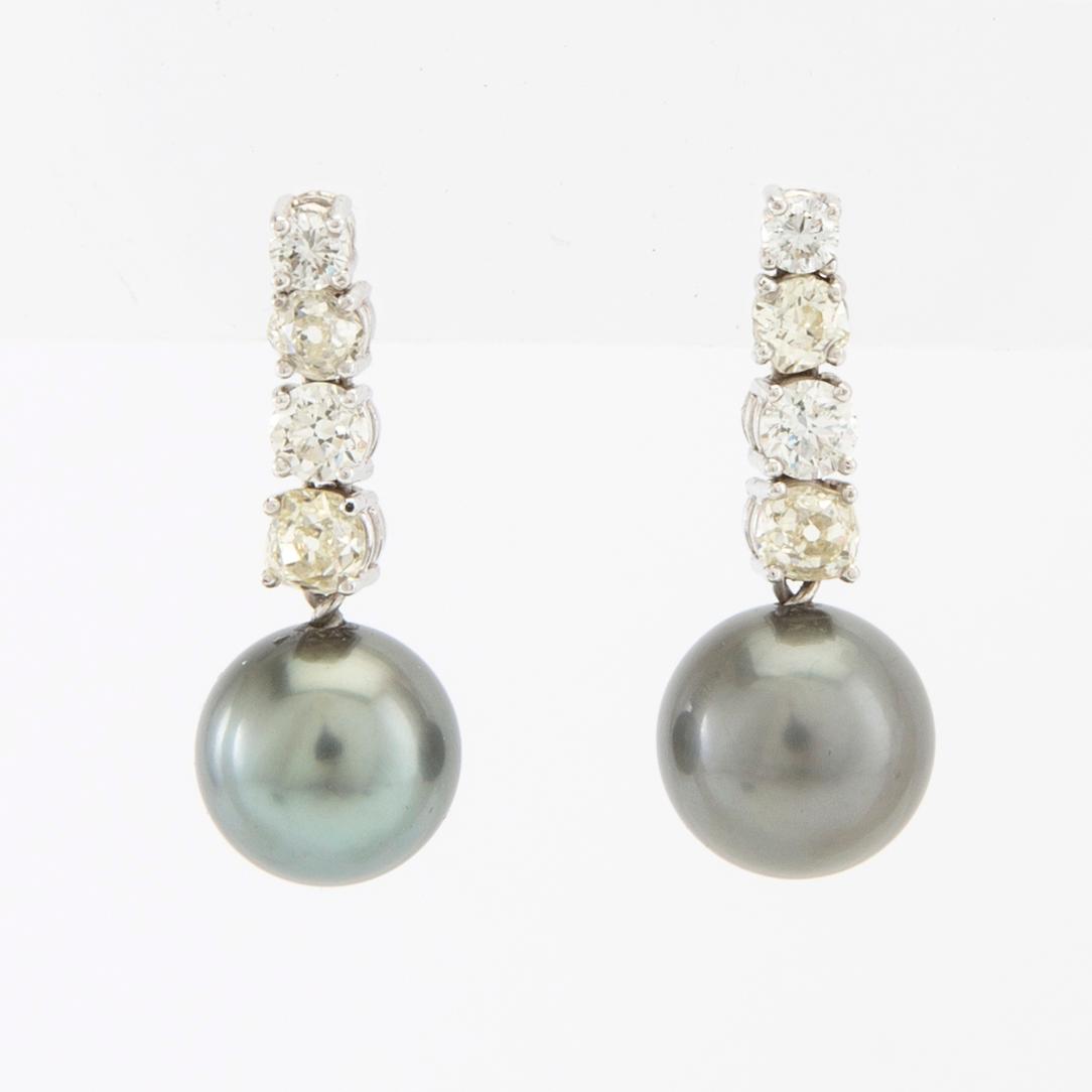 Earrings, a pair of 18K white gold with diamonds and cultured pearls.