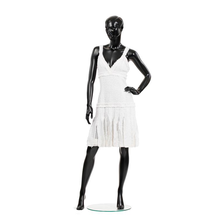 CHANEL, a white bouclé dress, 2004.