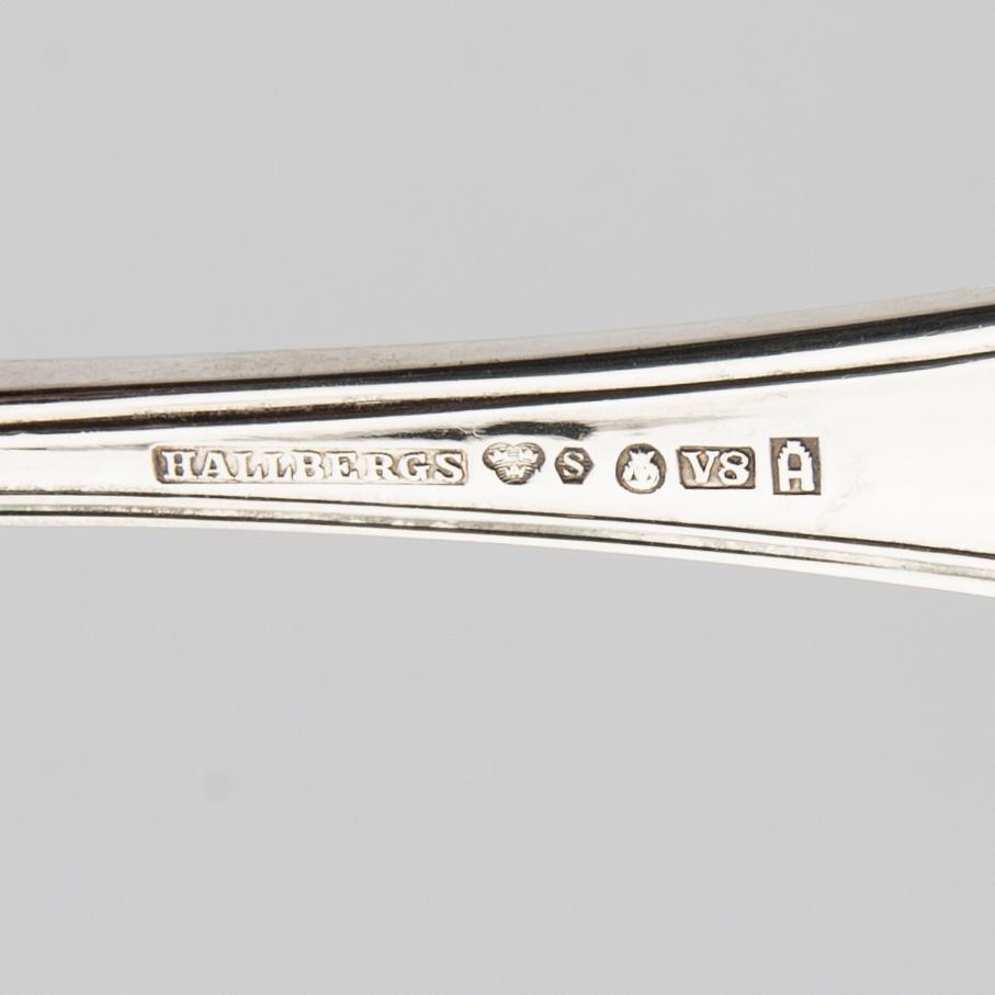A Swedish 20th century set of 12 silver fish cutlery mark of Hallbergs Stockholm 1947.