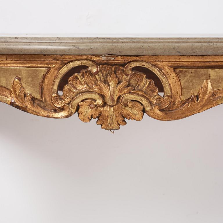 A Swedish giltwood and limestone console table, Stockholm, later part 18th century.