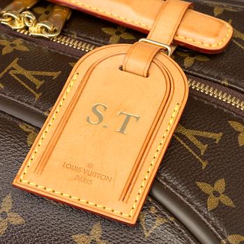 A Monogram Canvas "Zephyr" Suitcase by Louis Vuitton.