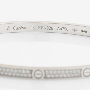 A Cartier "Love" bracelet small model in 18K white gold with round brilliant-cut diamonds.