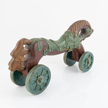 A children's toy horse, around the year 1900.