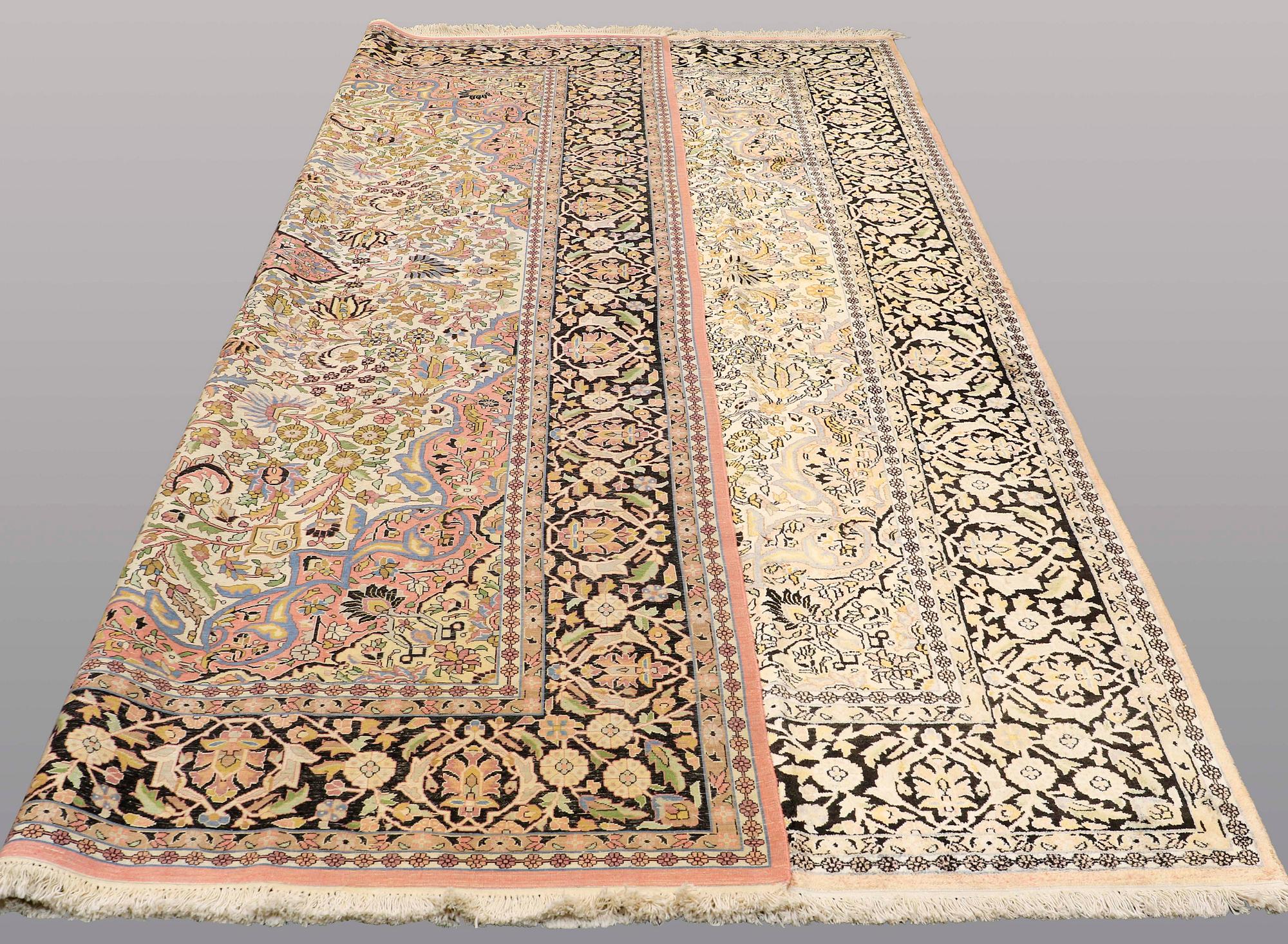 A CARPET, old silk Kashmir, ca 380 x 274 cm.