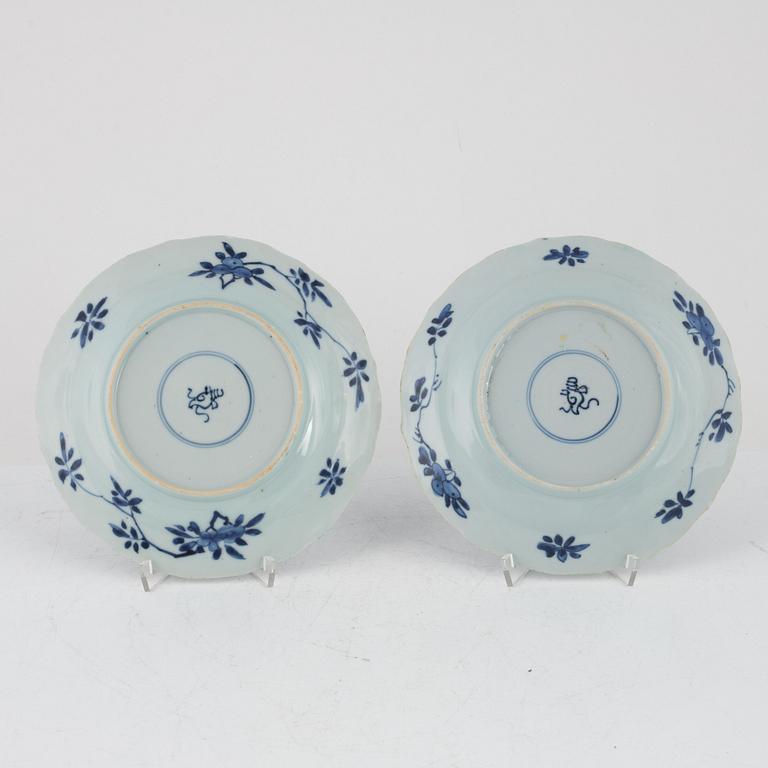 Two pairs of blue and white porcelain plates, China, Kangxi, 18th century, and Qian dynasty 18th/19th century.