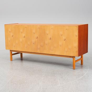 A second half of the 20th century teak veneered sideboard.
