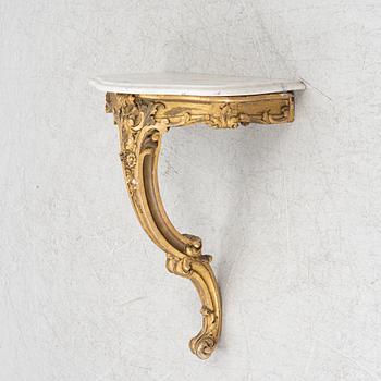 A Swedish rococo-style console table, 19th century.