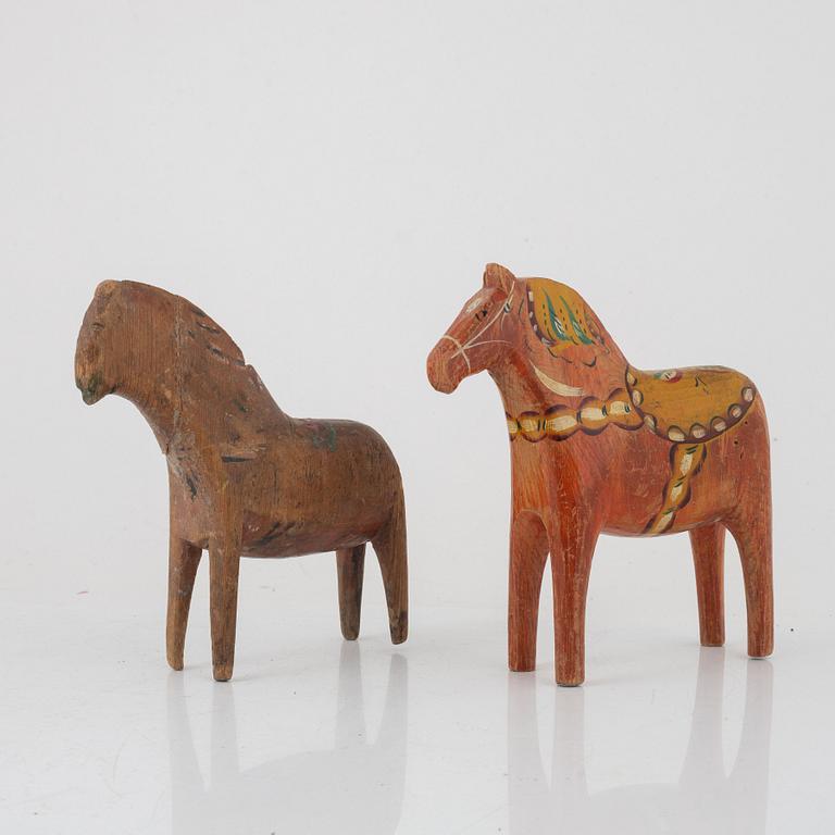 A pair of Swedish 'Dala' Horses, carved wood, early 20th century.