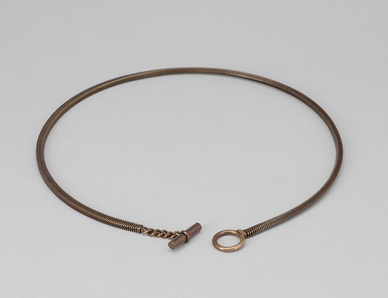 A chain belt by Yves Saint Laurent.