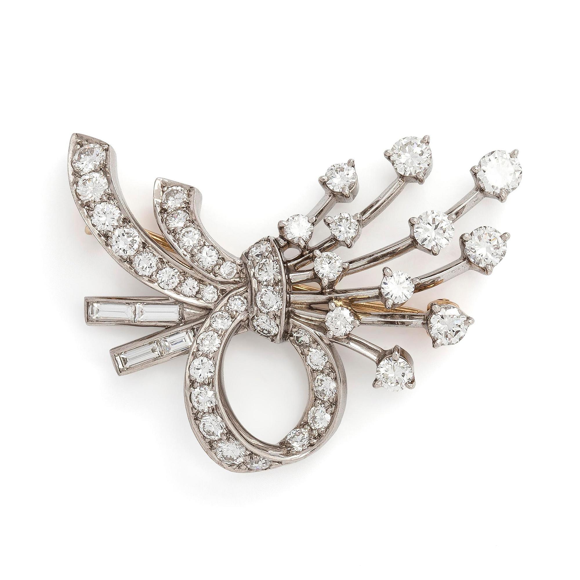 Tiffany & Co, A palladium brooch with brilliant- and baguette cut diamonds.