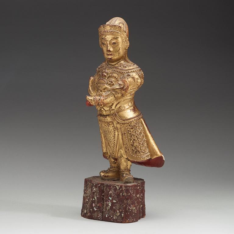 A wood sculpture of a guardian figure, (1644-1912).