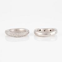 Ole Lynggaard two "Love" rings no. 4 in 18K white gold with round brilliant-cut diamonds.