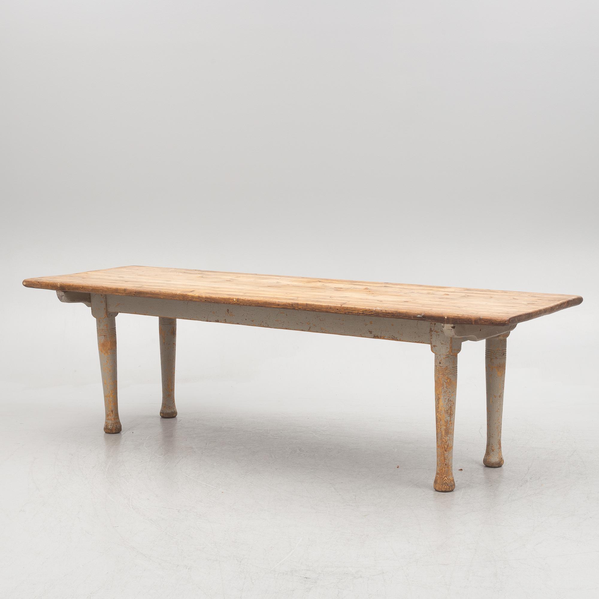 A dining table, late 19th Century.