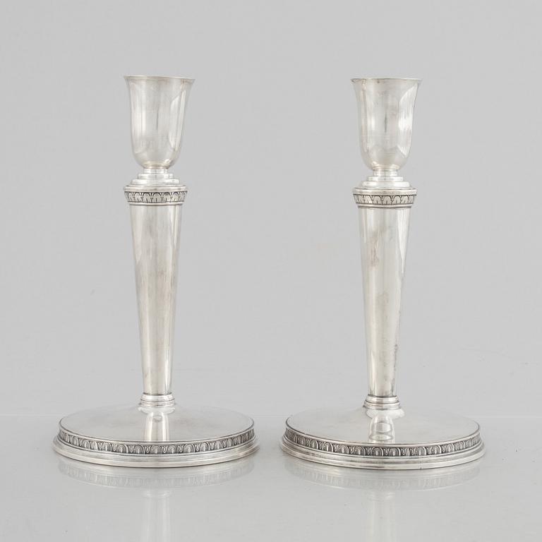 Eric Råström, a pair of silver candlesticks, Råströms Silver- O Nysilverfabrik , Stockholm 1957.