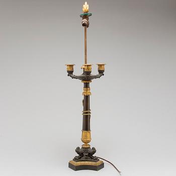 A first half of the 19th century bronze table lamp.