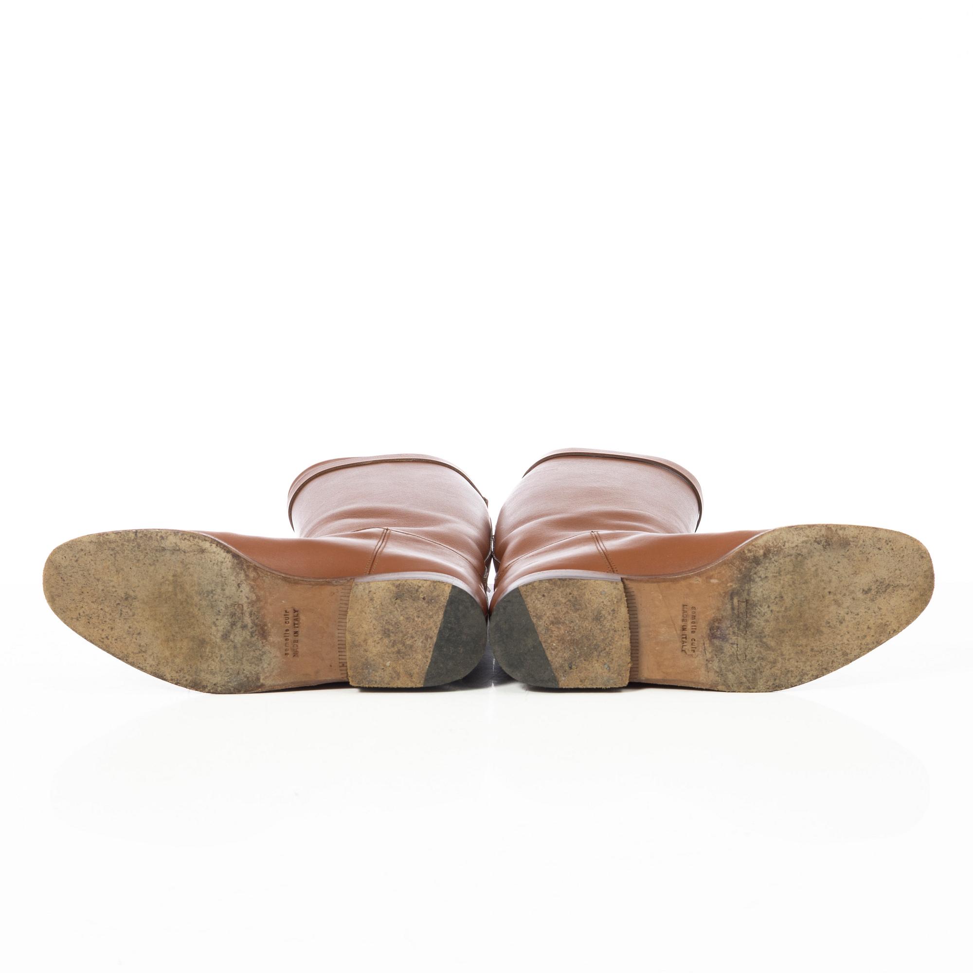 Hermès, a pair of riding boots.