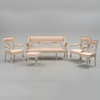 A set of two armchairs, a sofa, a stool and a chair. Early 20th century.