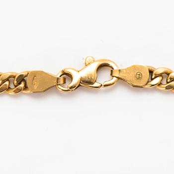 A set of 14K gold necklace and bracelet.