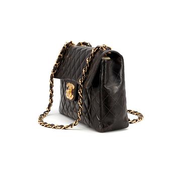 CHANEL, a quilted black leather shoulder bag, "Flap bag".