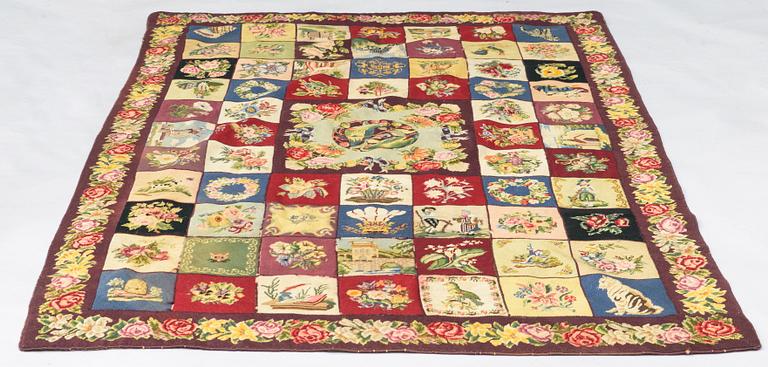 An embroided carpet, 1850-1900. Circa 195 x 130 cm.