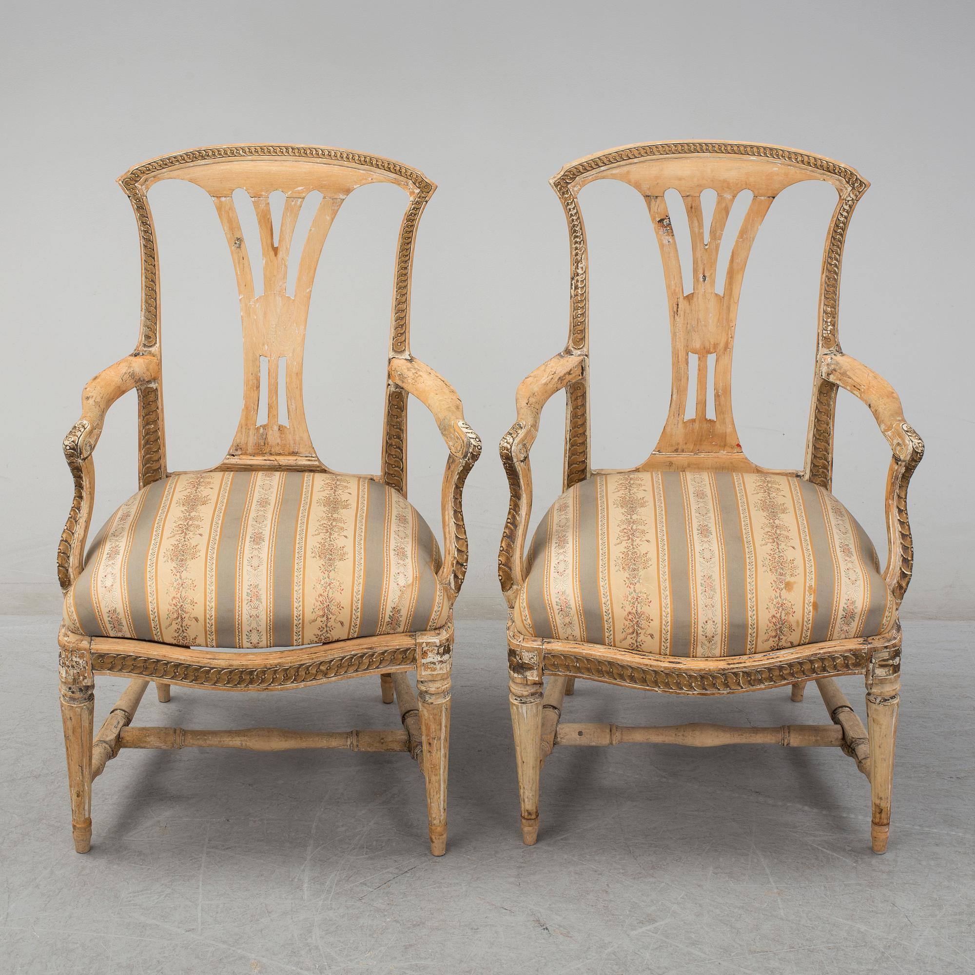 A pair of later part of th 18th century Gustavian arm chairs.