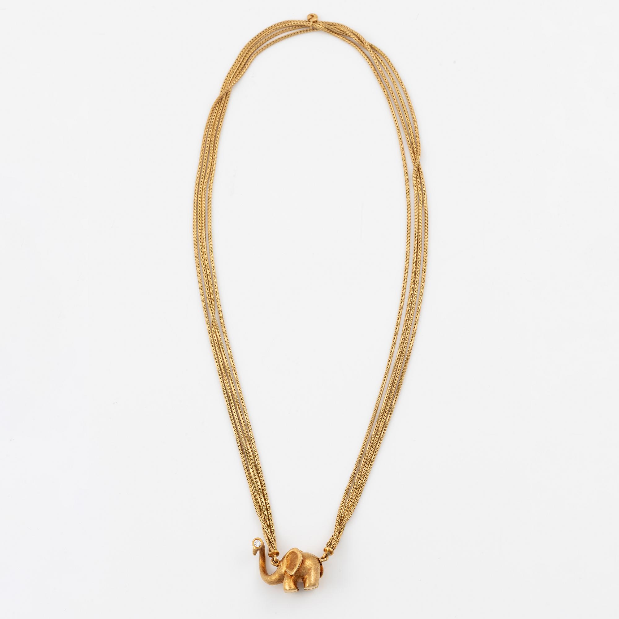 Ole Lynggaard lock 14K gold with a round brilliant-cut diamond.