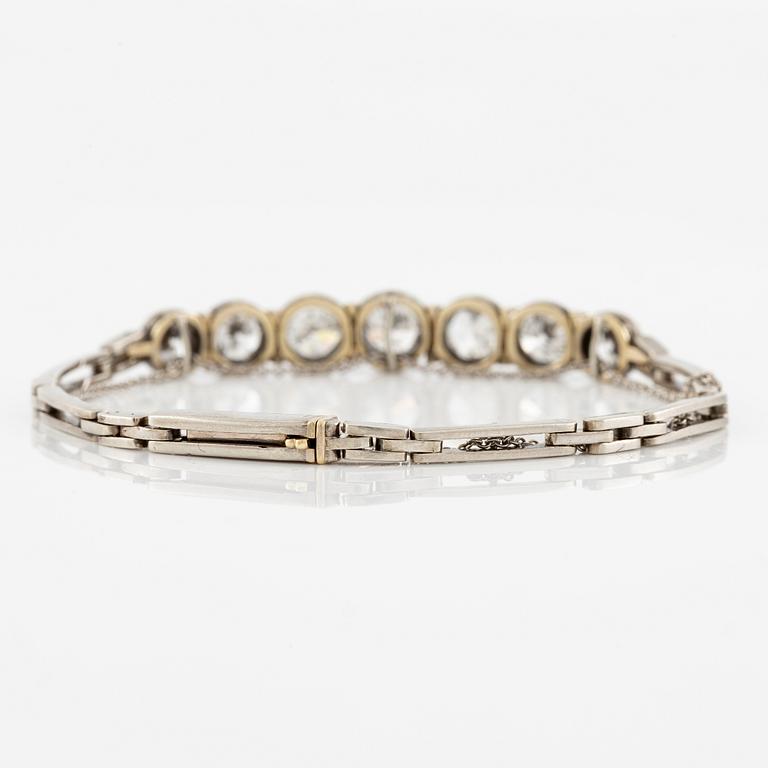 A bracelet in 14K white gold set with old-cut diamonds.