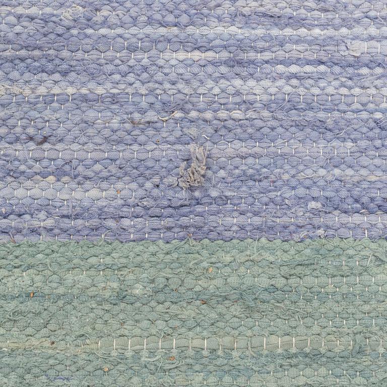 A rag rug, c. 300 x 195 cm.