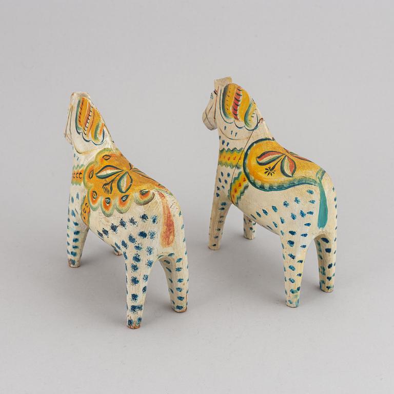 Two 20th century painted wooden horses.