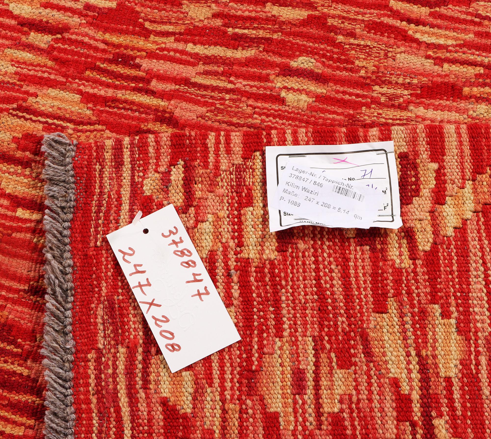 An Afghan Kilim carpet, c. 247 x 208 cm.