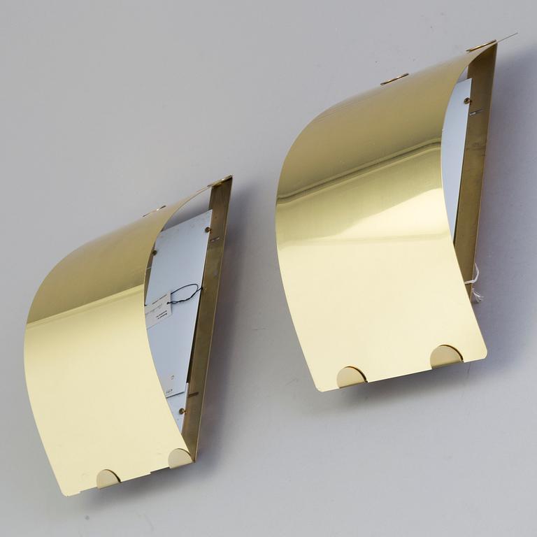 A pair of late 20th century brass wall lights for Ateljé Lyktan Åhus, Sweden.