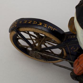 A partially hand painted tinplate Lehmann Halloh motorcycle, Germany. In production 1914-41.