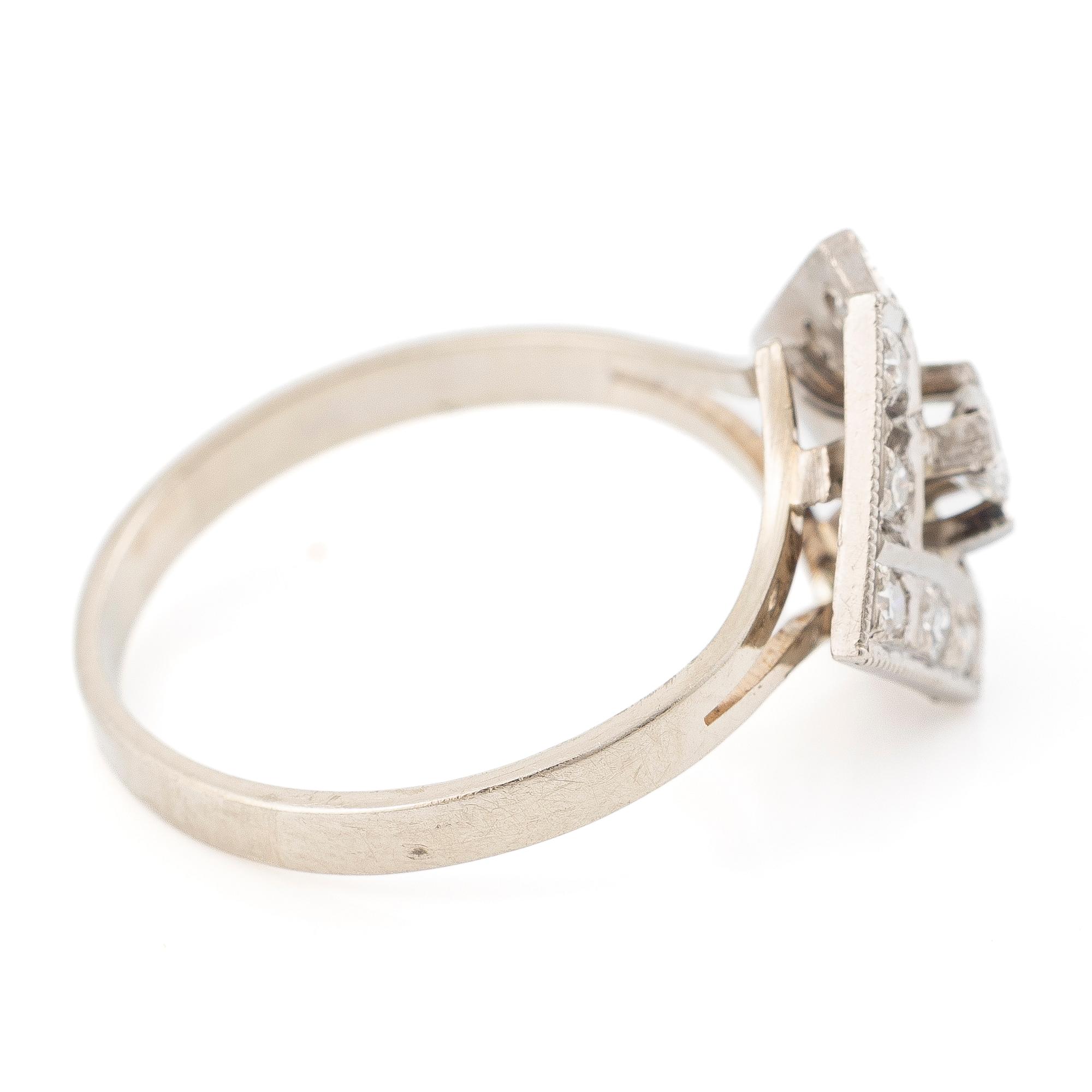 18K white gold ring set with brilliant-cut and single-cut diamonds, A. Koru 1981.