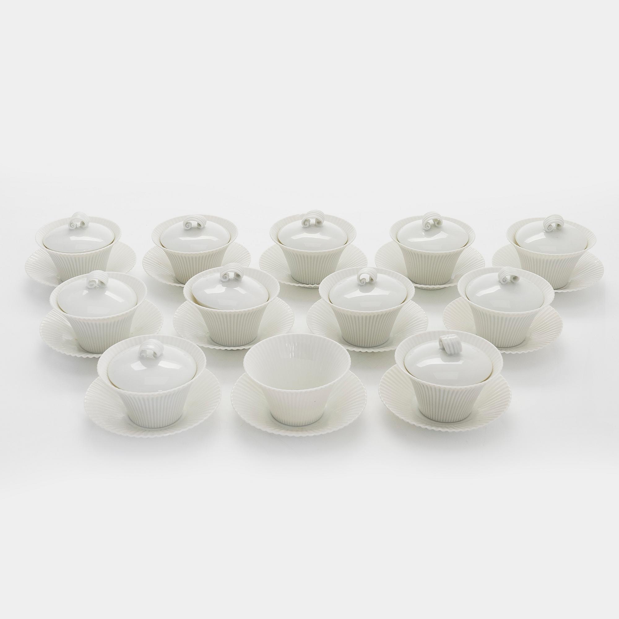 Aune Siimes, twelve porcelain custard cups signed AS ARABIA, 1950s/60s.