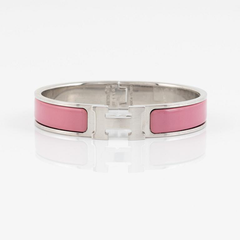 Hermès, a 'Clic H' bracelet.